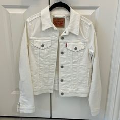 Never Worn! Slight Discolor Inside Collar Above The Tag From Felt Hanger. New Condition Otherwise! Smoke Free And Pet Free Home. Fast Shipping! White Fitted Denim Jacket For Fall, Fitted White Denim Jacket For Fall, Levi's White Spring Outerwear, Levi's White Denim Jacket For Spring, Levi's White Outerwear For Spring, Fitted Levi's Cotton Outerwear, White Denim Jacket With Pockets For Fall, Levi's White Outerwear For Fall, Classic White Denim Jacket With Pockets