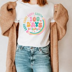 a woman wearing a happy birthday t - shirt