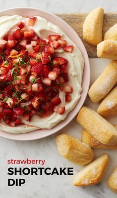 strawberry shortcake dip with fresh strawberries on top