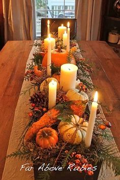 a table with candles, pumpkins and pine cones on it is shown in three different pictures