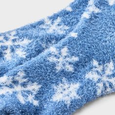 Wrap your feet in warmth and comfort with the Women's Snowflake Cozy Crew Socks - Auden™ 4-10. These soft, snug socks feature a playful snowflake pattern that adds a fun touch to your loungewear. Perfect for chilly days or relaxing at home, they’re made to keep your feet warm all day long. With a comfy fit and a bit of flair, these socks are a cozy essential for your wardrobe. Auden™: Fit for you in every way. Soft Winter Socks, Soft Indoor Socks For Winter, Casual Snug Blue Socks, Casual Warm Blue Socks, Warm Blue Socks For Stocking Stuffers, Comfortable Blue Winter Socks, Comfortable Blue Socks For Winter, Comfortable Soft Blue Socks, Casual Indoor Socks For Winter