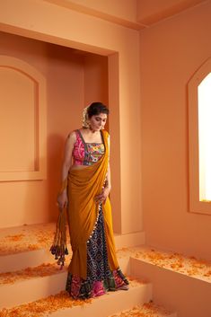 Introducing our Artsilk Bandhani Drape Chiffon Saree, paired with a Pink Kutchwork Blouse - a mesmerizing fusion of tradition and contemporary design. Saree Details: Fabric: Chiffon and Art Silk Print: Colorful Artsilk Bandhani Our Chiffon Saree in Artsilk Bandhani print is a celebration of elegance and vibrant craftsmanship. Crafted from lightweight chiffon, it drapes gracefully and comfortably, making it an ideal choice for a variety of occasions. The Colorful Artsilk Bandhani print adds a tou Seedha Pallu Saree Style, Bandhani Dresses, Bandhani Blouse, Mirror Lace, Bandhani Print, Bandhani Dress, Design Saree, Blouse Details, Silk Kaftan