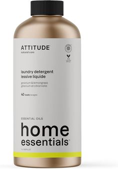 a bottle of attitude laundry deterant on a white background with the words, home essentials