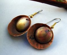 "Dangle Copper Earrings - Hammered Copper color Patina on Light weight Concave and Convex circles come together with a great patina. Gift for Mom or Sister, Fun and Casual and great with Jeans and t-shirt. Larger discs are 1\" across and hang from a surgical steel or Sterling silver ear wire. Oxidized to get the patina and light as a feather. I Can put sterling wires on these. 1 1/2\" long Casual fun earrings for him or her. Thanks" Artsy Nickel-free Copper Earrings, Bronze Artsy Earrings For Gifts, Artsy Bronze Earrings For Gift, Artsy Copper Dangle Earrings, Artsy Pierced Copper Earrings, Artsy Copper Earrings For Pierced Ears, Brown Artsy Earrings, Nickel-free Bronze Artsy Earrings, Artistic Copper Earrings