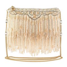 Layers of beaded fringe and faceted crystals create a beautiful bag that is ready to shimmy and shake on the dance floor or walk down the aisle. The elegant craftsmanship makes this crossbody handbag as unforgettable as your big day! 9 x 1.25 x 7"Strap Length End to End: 49"Strap Drop: 23"Removable crossbody chain strap, zipper closure, inside pocket, metal logo fob, protective storage bag, certificate of authenticity, fits a phoneThis is a handmade item, each one an individual work of art. Slight variations may occur. Homecoming Accessories, Flapper Accessories, 1920s Outfits, Walk Down The Aisle, Prom Accessories, Western Accessories, Mary Frances, Timeless Classic Style, On The Dance Floor