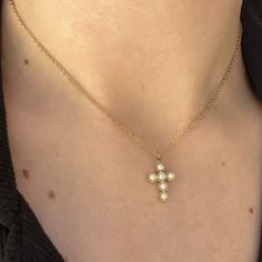 "The Pearl Cross Necklace 🤍 Featuring a unique gold cross with faux Pearl detailing and an 18k gold plated stainless steel oval link chain 16\" in length and shower proof!  Unisex & tarnish proof 🖤 each will come with an extender for adjustability.  Made with love 🫶" Delicate Gold Cross Chain Jewelry, Gold Cross Necklace With Delicate Pendant, Gold Chain Jewelry With Cross Pendant, Yellow Gold Cross Chain Jewelry, Yellow Gold Cross Chain Necklace, Gold Cross Pendant Chain Jewelry, Gold Plated Cross Chain Jewelry, Gold Pendant Cross Necklace With Chain, Gold Cross Jewelry With Adjustable Chain