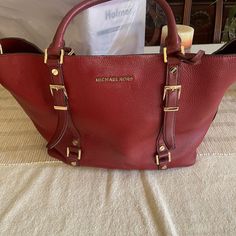 Red Mk Purse. Classic Bag . Matching Wallet For Additional $50. Excellent Condition No Wear No Stains. New Condition Red Luxury Satchel With Leather Handles, Luxury Red Satchel With Leather Handles, Designer Burgundy Shoulder Bag With Branded Hardware, Red Travel Bags With Gold-tone Hardware, Red Leather-handled Satchel For Formal Occasions, Designer Red Satchel For Travel, Red Leather Bag With Gold-tone Hardware, Designer Red Bags With Gold-tone Hardware, Elegant Red Satchel With Leather Handles