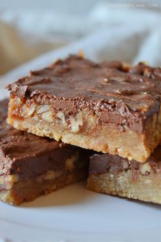 chocolate and cranberry bars stacked on top of each other