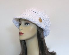 This is made to order. Crocheted with soft chunky acrylic yarn. Buttons may vary depending on availability. Hand wash is recommended. White Beret, Crochet Cap, Visor Cap, News Boy Hat, Newsboy Cap, White Hat, White Crochet, Acrylic Yarn, Crochet Hats