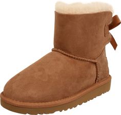 PRICES MAY VARY. Pretreated to repel stains and moisture Sheepskin lining Rubber sole Mini Baileys, Bow Boots, Bailey Bow, Kids Uggs, Synthetic Rubber, Kids Luggage, Big Kid, Pharmacy Gifts