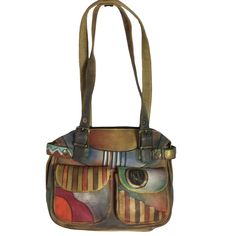 Anuschka Handpainted Leather Medium Buckle Shoulder Bag Southwest Tribal Never Used But Has Two Unmatched Shoulder Straps With Slight Variation In Length And Color (Third To Last Photo), Genuine Handpainted Leather, Handcrafted Bag Including A 100% Cotton Unbranded Storage Bag. Care Instructions In Last Photo. Top Zip Entry To Main Compartment Outside Front Has Two Snap Pockets Outside Back Has Zip Pocket Inside Back Wall Has Zip Pocket Inside Front Wall Has Two Multipurpose Pockets Attached Key Artisan Hand Painted Brown Bags, Artisan Leather Bags Hand Painted, Everyday Hand Painted Shoulder Bag, Artistic Hand Painted Leather Shoulder Bag, Artistic Leather Shoulder Bag With Adjustable Strap, Artisan Hand Painted Shoulder Bag For Everyday, Artistic Hand Painted Crossbody Shoulder Bag, Artistic Hand Painted Brown Bag, Artistic Brown Hand Painted Bag