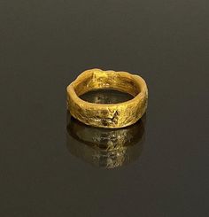 Smashing Rough Looking 22k Solid Gold Wide Wedding Ring Unisex Wedding Band, Fine Jewelry, Handmade,Resizable. Weight: 12g Width: 6.5mm Thickness: 2mm Size: 13 US Size: 6.5 (Please convo me for a different size) Free Shipping! Luxury Hammered Jewelry For Weddings, Unique Hand Set Gold Rings, Handmade Yellow Gold Wedding Jewelry, Hammered 22k Gold Wedding Jewelry, Handmade Gold Rings For Marriage, Gold Hammered Wedding Rings, Raw Gold Ring, Wide Wedding Rings, Etsy Wedding Rings