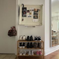 there is a shoe rack with shoes on it