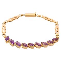 Bracelets are worn to enhance the look. Women love to look good. It is common to see a woman rocking a lovely gold bracelet on her wrist. A gold gemstone bracelet is the ultimate statement piece for every stylish woman. Adorn your wrist with this beautiful marquise cut amethyst bracelet in 18 Karat Gold. Each piece is handmade with a unique shape of precious stone. This elegant and lightweight bracelet is perfect for everyday wear. PRODUCT DETAILS :- Material - 18K Solid Yellow Gold Gemstone - A