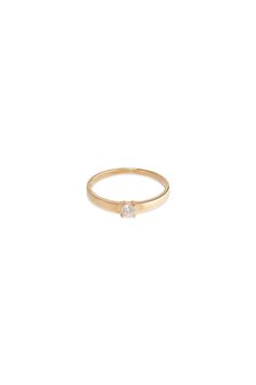 ITEM INFO. Discover the beauty of simplicity with our 14K Solid Gold CZ 4 Prong Simple Stackable Ring. Crafted with elegance and minimalism in mind, this ring features a single cubic zirconia stone held in place by four prongs. Made with 14K solid gold for durability and a timeless appeal. The sleek and understated design of this ring makes it perfect for stacking with other rings or wearing on its own. Available in multiple sizes to ensure the perfect fit for your finger. Elevate your style with the simplicity and elegance of our 14K Solid Gold CZ 4 Prong Simple Stackable Ring. PRODUCT INFO ✓Material 14k Solid Gold✓Size (App.) US Size : 7, Request for different sizeWeight: 1.42G ✓Color Gold✓Made by South Korea ✓Ship From Los Angeles (U.S) ................................... Classic Everyday Stackable Rings With Brilliant Cut, Classic Everyday Rings With Tension Setting, Minimalist Vvs Clarity Round Cut Birthstone Ring, Minimalist Vvs Clarity Birthstone Ring, Minimalist Cubic Zirconia Diamond Ring With Tension Setting, Minimalist Cubic Zirconia Ring With Brilliant Cut, Minimalist Single Diamond Ring For Everyday, Minimalist Round Cut Everyday Birthstone Ring, Simple Solitaire Ring With Round Band