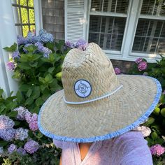 Celebrate Nantucket without even getting on the ferry! Our Nantucket print straw hat features all of our favorite ACK landmarks from Sankaty Head Lighthouse to the Christmas Stroll and Daffodil Weekend! hand-drawn print at edge and underside of brim white string drawcord front woven patch 24" circumference Blue Straw Hat With Curved Brim For Outdoor, Blue Curved Brim Straw Hat For Outdoor, Coastal Blue Hat For Vacation, Coastal Straw Hat For Outdoor, Blue Coastal Hat With Curved Brim, Blue Coastal Style Hat With Curved Brim, Adjustable Nautical Hats For The Beach, Adjustable Nautical Beach Hat, Nautical Style Beach Hat With Curved Brim