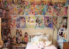 a bed room with a neatly made bed and lots of cartoon pictures on the wall