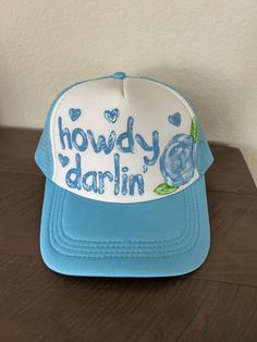 Howdy Darlin' hand painted trucker hat!  Custom colors and designs available. Message me for info! Hand Painted Hats Design, Handmade Casual Trucker Hat, Custom White Trucker Hat, Handmade Fun Trucker Hat, Adjustable Hand Painted Blue Hat, Casual Hand Painted Cap, Painted Trucker Hats, Adjustable Blue Hand Painted Hat, Fun Trucker Hat For Country Events One Size