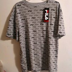 Is The High Quality Trading T-Shirt Fabric Is Very Soft It's Well-Made Price To Sale Casual Gray Shirt With Text Print, Heather Grey Short Sleeve Top With Graphic Print, Casual Heather Grey Top With Text Print, Casual Heather Grey Crew Neck Shirt, Gray Casual Shirt With Logo Print, Casual Gray Shirt With Logo Print, Gray Crew Neck Graphic Tee Shirt, Gray Short Sleeve Tops With Letter Print, Gray Crew Neck Shirt With Logo Print