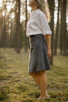 "Each our linen skirt is handcrafted to fit your individual body measurements. We take pride in the fact that there are no factory processes involved in making our linen clothes. Each linen skirt is made with care and attention to detail. DESCRIPTION This linen skirt is made using a minimalistic design and a modest, everyday look. Made from 100% softened linen. Its multiway use makes it suitable for any occasion, effortlessly transitioning from casual to more formal look. Has a slight A-line sil Fitted Linen Flared Skirt, Fitted Linen Pencil Skirt, Fitted Flared Linen Skirt, Fitted Linen Long Skirt, Fitted Linen Wrap Skirt With Lining, Linen Fitted Skirt With Gathered Details, Fitted Linen Mini Skirt, Fitted Linen Skirt With Gathered Detail, Relaxed Linen Mini Skirt