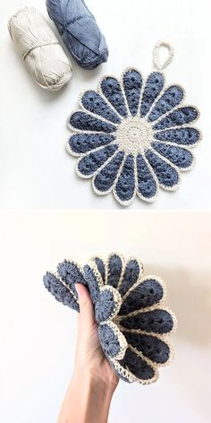 crocheted doily with yarn in the middle and two hands holding it up