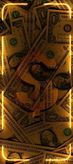 a pile of money with the letter f on it's side and yellow lights