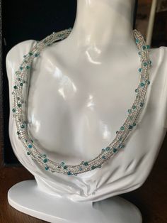 "I have crocheted from stainless steel wire this necklace with beautiful faceted green onyx! This word is hypoallergenic, so lightest, won't tarnish and it's affordable The onyx had a lovely sparkle The necklace measures approximately 18\" in length.  There is a lobster claw closure. Shipping is free within the USA. Thank you for looking!" Elegant Turquoise Wire Wrapped Beaded Necklace, Handmade Turquoise Briolette Necklace, Sterling Silver Turquoise Necklaces With Faceted Beads, Handmade Necklaces With Round Beads For May Birthstone, Handmade Necklaces With May Birthstone Round Beads, Handmade May Birthstone Necklaces With Round Beads, Multi-strand Crystal Beaded Necklace For Gift, Multi-strand Faceted Beads Crystal Necklace As Gift, Faceted Multi-strand Necklace As Gift