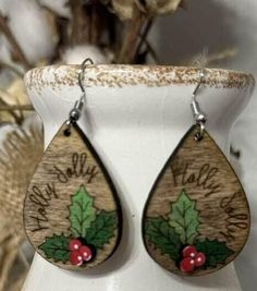 These wood earrings are super cute and made from natural wood. They are lightweight with hand painted accents that are sure to grab attention for the Holiday Season.  * Please Note: The color tones of each wood earring may vary slightly from the pictures. Color Tones, Holly Jolly, Colour Tone, The Holiday, Favorite Jewelry, Natural Wood, Jewelry Earrings Dangle