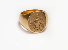 Mens Gold Crest Ring Antique Gold Oval Signet Ring With Coat Of Arms, Formal Gold Signet Ring With Coat Of Arms, Classic Yellow Gold Engraved Ring With Coat Of Arms, Formal Yellow Gold Signet Ring With Coat Of Arms, Formal Yellow Gold Coat Of Arms Ring, Luxury Yellow Gold Signet Ring With Coat Of Arms, Luxury Yellow Gold Coat Of Arms Signet Ring, Formal Yellow Gold Engraved Ring With Coat Of Arms, Luxury Yellow Gold Signet Ring With Maker's Mark