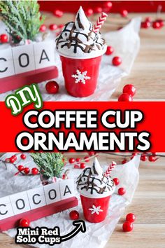 coffee cup ornament with candy canes and snowflakes on top, sitting next to each other