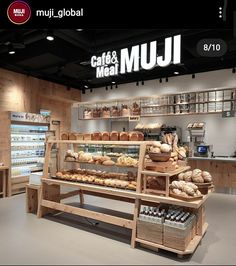 an image of a bakery store with bread and muffins