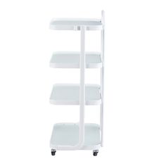 a white shelf with three shelves on wheels