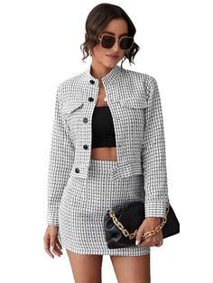 Make a lasting impression in this fashionable plaid tweed blazer jacket & skirt set. Made out of premium fabrics, the tweed blazer jacket features a timeless plaid pattern for an elegant look. The skirt features an alluring skirt silhouette for an added touch of sophistication. Perfect for office or dress-up occasions, this plaid tweed set will have you looking fashionable and feeling confident. Soft Fabric Button closure Machine Wash Fabric has non stretch Elegant Tweed Skirt Suit For Work, Elegant Tweed Skirt Suit For Office, Plaid Tweed Blazer For Business Casual, Elegant Houndstooth Tweed Jacket For Office, Chic Tweed Skirt Suit For Formal Occasions, Long Sleeve Tweed Skirt Suit For Formal Occasions, Elegant Plaid Tweed Jacket For Business Casual, Formal Long Sleeve Tweed Skirt Suit, Chic Houndstooth Tweed Jacket For Formal Events