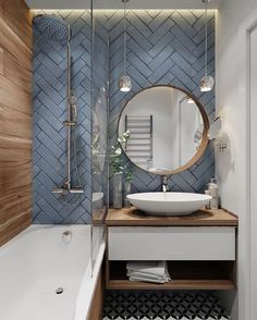 a bathroom with a sink, mirror and bathtub next to a wall mounted faucet