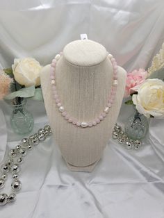 This 18 inch necklace was beaded with 10mm sized rose quartz beads and fresh water pearls. White Rose Quartz Round Bead Necklaces, Elegant Pink Beaded Necklaces With 8mm Beads, Elegant Pink Beaded Necklace With 8mm Beads, White Rose Quartz Round Bead Necklace, Elegant Pink Necklaces With 8mm Beads, Pink Pearl Necklace With Gemstone Beads, Pink Pearl Beaded Necklaces With Gemstone Beads, Pink Pearl Necklace With Natural Round Beads, Pink Pearl Necklace With Round Natural Stones