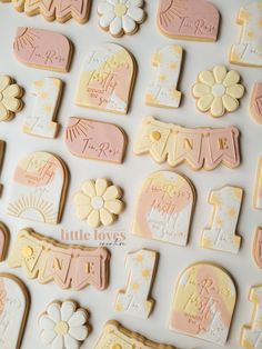 decorated cookies are displayed on a white surface