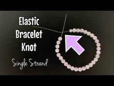 an easy bracelet knot for single strands with white beads and purple arrow on it