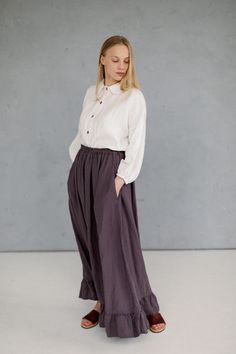 Linen maxi skirt with ruffles for women. Romantic, flowing and soft: made from soft linen it feels extremely smooth and pleasant on the skin. * Made of 100% natural washed and soft medium weight OEKO-TEX certified linen (160g). * Linen skirt with two inner pockets on the sides. * Ruffled bottom. * High-waisted, flared shape skirt. * Color in the picture: purple. Discover more of La Petite Alice organic linen clothes and accessories here: https://www.etsy.com/shop/Lapetitealice **The shipping cos Relaxed Ankle-length Maxi Skirt With Elastic Waistband, Embroidered Cotton Bottoms With Flowy Fit, Embroidered Flowy Long Skirt, Relaxed Fit Long Gathered Skirt, Long Gathered Skirt With Relaxed Fit, Peasant Style Long Flowy Skirt, Peasant Long Lined Skirt, Traditional Gathered Skirt Bottoms For Spring, Traditional Gathered Skirt For Spring