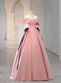 Feel like royalty in this stunning prom dress, where timeless elegance meets modern sophistication. The gown's blushing pink shade captures the essence of youth and joy, while the plush folds at the neckline exude a regal charm. Black bows provide a striking visual contrast, adding a layer of contemporary chic to the classic design. The structured bodice gives way to a voluminous skirt, creating a flattering profile that is both majestic and airy. A subtle sheen across the fabric ensures that the dress catches the light with a delicate glimmer, making it a true showstopper. This dress is an homage to the power of feeling confidently beautiful, inside and out. Bow Prom Dress, Unique Gowns, Scoop Neck Prom Dress, Voluminous Skirt, Black Bows, Stunning Prom Dresses, Beautiful Silhouette, Ever Pretty, Beaded Prom Dress