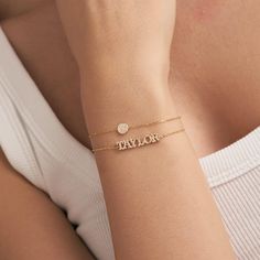 1- P R O D U C T ∙  D E S C R I P T I O N Discover the elegance of our Diamond Name Bracelet, handcrafted from 14k Solid Gold. This Uppercase Letter Bracelet is the perfect personalized gift for her, exuding timeless charm and sophistication. Each piece is meticulously designed for durability and comfort, making it an ideal accessory for everyday wear. This unique, customizable bracelet is the epitome of luxury and style, sure to captivate and impress. 2- P R O D U C T ∙  D E T A I L S Diamond q Gold Name Bracelet, Bracelet Initial, Letter Bracelet, Initial Bracelet, Personalized Gifts For Her, Name Bracelet, Personalized Rings, Diamond Bracelets, Birthstone Necklace