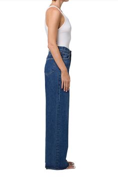 Featuring a waist accentuating high-rise, a relaxed cut through the hips and a wide leg. Create an ultra-flattering silhouette by styling it with a sleek tee. Crafted in our signature Organic Cotton - this pair will only get softer with each wear. Intended to have a relaxed fit. For a higher, closer fit, we recommend sizing down. Looks Like: Saturated medium indigoFeels Like: Non-stretch organic cotton that offers a luxurious drape for all-day movement Closure: Button Fly Rise: 12 1/2" Inseam: 3 Dark Vintage, Heel Accessories, Sneaker Heels, Flat Boots, Denim Pant, Sweater Skirt, Sweater Jacket, Stretch Cotton, Style Guides