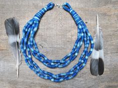 Only one blue fabric necklace for women has been totally woven in my little studio. Unique piece of jewelry in a style folk - bohemian - ethnic - tribal. This braided bib necklace is eco - friendly, soft and very light to wear. I mix different ends of yarn to create unique organic fiber jewelry. All woven cords are the effect of work of my hands. That's why each necklace in this series is one of a kind and unique. >>I hope that my jewelry introduced even a little magic and made you smile m Handmade Blue Bohemian Bib Necklaces, Adjustable Handwoven Blue Necklace, Blue Fair Trade Beaded Necklaces For Festivals, Handmade Gift For Mom, Fiber Jewelry, Fabric Necklace, Bib Necklaces, Boho Gifts, Support Handmade