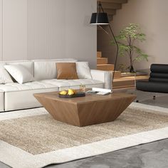 a living room filled with furniture and a white rug