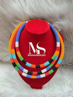 100% handcrafted using fine beads. Masai choker necklace is truly African inspired just for you.You will get a lot of compliments when you wear this statement necklace,that's designed in a variety of colours,to create a breathtaking piece.. Native American Crafts, Maasai, Brass Bracelet, Zulu, Star Bracelet, African Jewelry, African Inspired, Traditional Wedding, Wholesale Jewelry