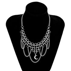 Description:Gothic Layered Moon Phase Pendant Chain Tassel Collar Choker NecklaceSpecification:Size: 13.7" + 2.7" extWeight: 1.44 oz/pcsMaterial: alloy metalChain colors: silverFeatures & Details:This gothic chain tassel collar choker necklace is made of nickel-free. lead-free. cadmium-free and hypoallergenic materials. which will not turn your skin green or cause anaphylactic reaction.It is easy to match your different outfits and also suitable for any occasions like wedding. banquet. costume p Gothic Alloy Clavicle Chain Necklace, Gothic Metal Clavicle Chain Necklace, Gothic Layered Necklace, Gothic Metal Clavicle Chain Choker, Silver Gothic Chain Choker, Choker Collar, Enamel Bracelet, Different Outfits, Moon Phases