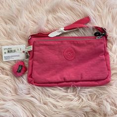 Brand New With Tags, Kipling Cross Body Bag. Perfect Gift! Casual Pink Bag With Zipper Pouch, Casual Zipper Pouch Bag As Gift, Pink Foldable Bag For Daily Use, Pink Foldable Rectangular Bag, Casual Gift Pouch With Adjustable Strap, Casual Pouch With Adjustable Strap For Gift, Casual Pouch With Adjustable Strap As Gift, Casual Pink Clutch Bag, Casual Foldable Pouch Bag