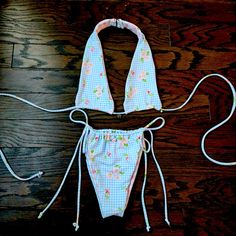 Handmade Bikini Made By Me. This Is A Halter Style Bikini With A Hook And Loop Around The Neck. It’s So Cute And In Style With The Gingham Fabric And Cherries With Flowers. Cherries Are A Y2k Staple. Gingham Swimwear For Sunbathing In Spring, Spring Gingham Swimwear For Sunbathing, Gingham Swimwear For Sunbathing During Beach Season, Fitted Tie-side Bottom Swimwear For Spring, Fitted Tie-side Swimwear For Spring, Spring Fitted Tie-side Swimwear, Gingham Swimwear For Summer Beach Party, Gingham Swimwear For Beach Party Season, Summer Triangle Top Swimwear For Picnic