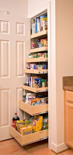 an open pantry door with food in it