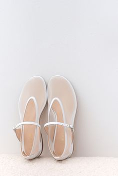 White sheer tulle flats with an almond toe are made to measure from a soft mesh and natural leather with a comfortable low heel.  Transparent and minimalistic, made only from high-quality materials, these ballerina shoes will perfectly complement any look. Can be used as everyday flat shoes, ballet flats, or for any special occasion. Sort cushioned insoles along the entire length of the shoe will remember the position of the foot and add comfort. Anti-slip outsoles are a mixture of leather chips and rubber, it's more wear-resistant than leather and more durable. Also, we use soft natural upper materials that wear well and take the shape of the foot. In the photos:  STYLE name: Nino MATERIALS: soft white tulle, white leather COLOR: White PERSONALIZATION: I can offer you a custom-made shoe d White Ballet Flats For Spring Evening, Elegant Ballet Flats With Translucent Outsole, White Low Heel Ballet Flats For Summer, White Pointed Toe Ballet Flats For Summer, White Closed Toe Ballet Flats For Summer, Everyday Flats, Shoes Ballet Flats, Mesh Flats, White Tulle