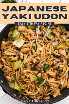 japanese yaki udon recipe in a skillet with chopsticks